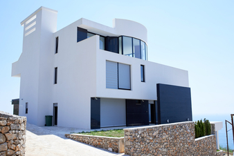 External view of a contemporary house modern villa at sunset
